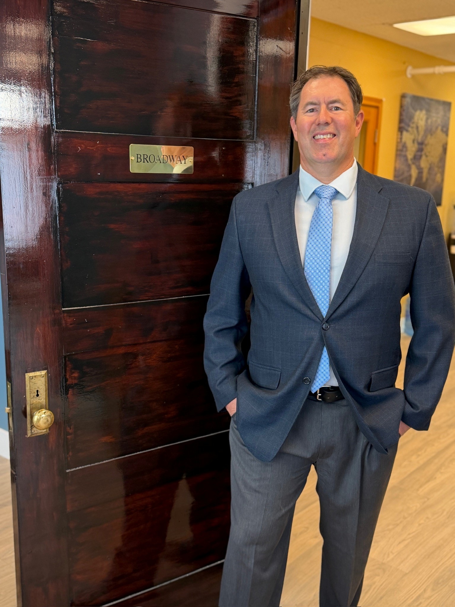 Mitch Vap standing at the entrance to the Broadway conference room in Missoula, Montana