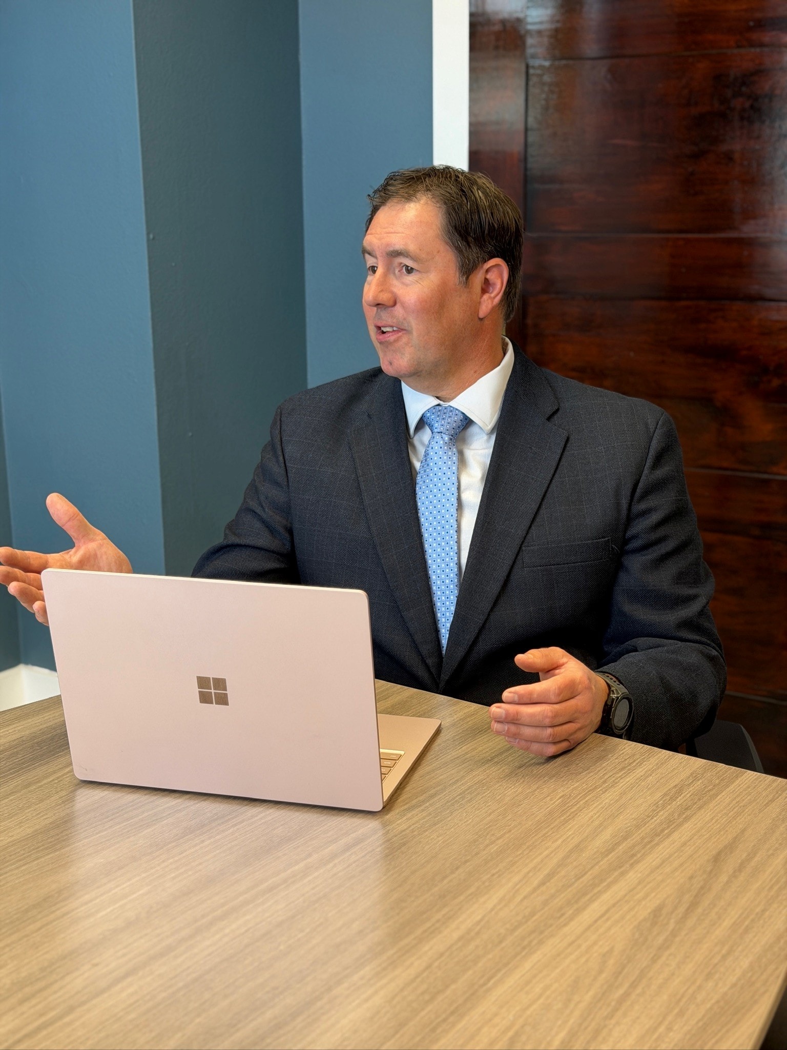 Mitch Vap, mediator, engaged in discussion with a mediation participant at a conference table in Missoula, Montana